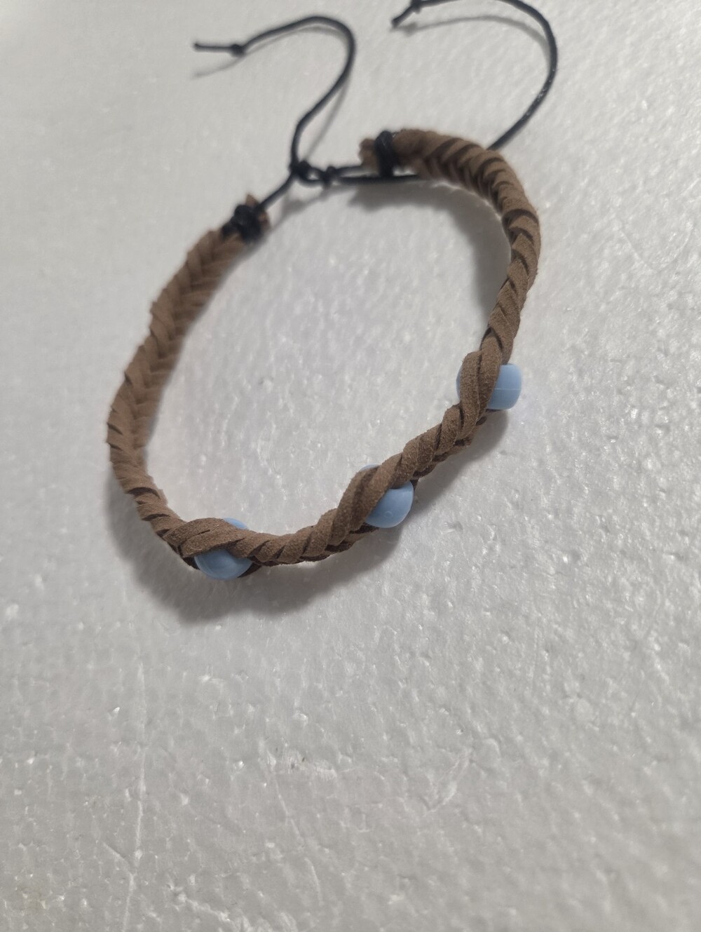 Handcrafted Braided Brown Suede Bracelet with Light Blue Beads